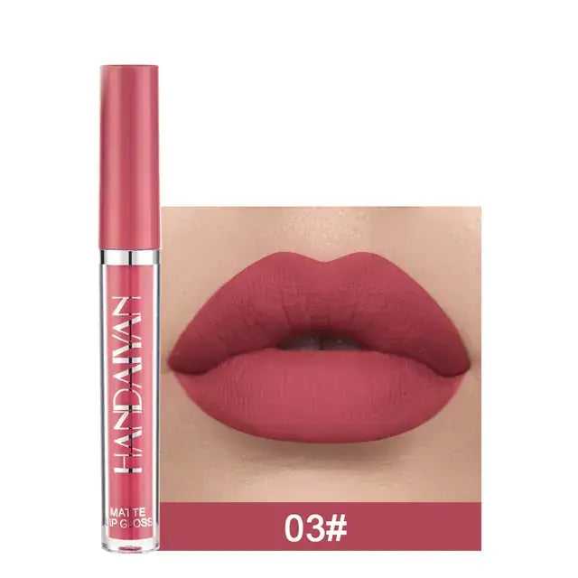 Matte Velvet Lip Gloss in shade 03 displayed with matching lip color swatch, essentials for beauty.