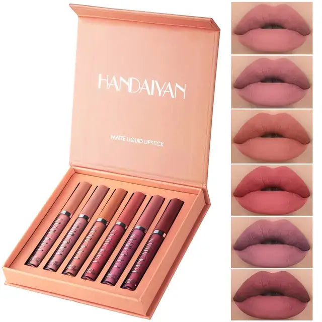 6PC Matte Velvet Lip Gloss Set in shades of pink and nude, displayed in an open box, showcasing essentials for beauty.